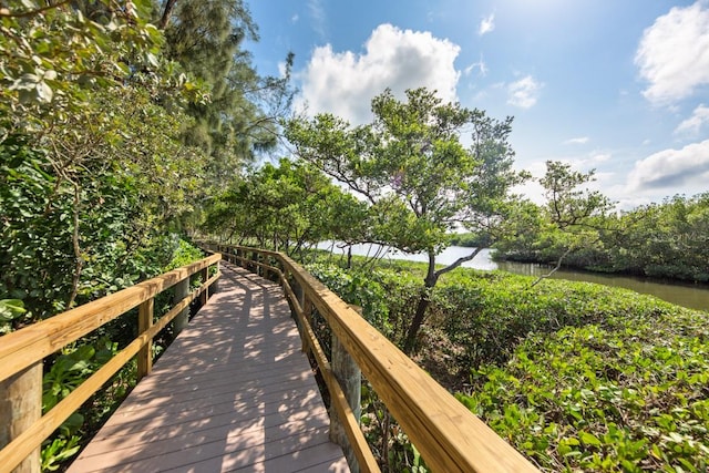 surrounding community featuring a water view