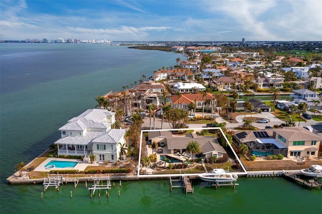 drone / aerial view with a water view