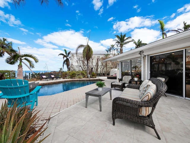 view of swimming pool featuring a patio area and an outdoor hangout area