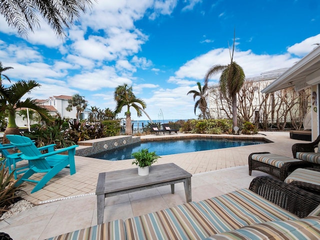 view of pool featuring a patio area