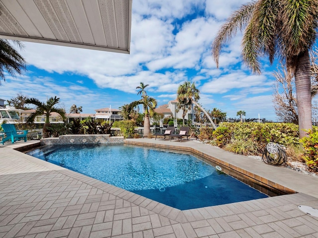 view of pool with a patio area