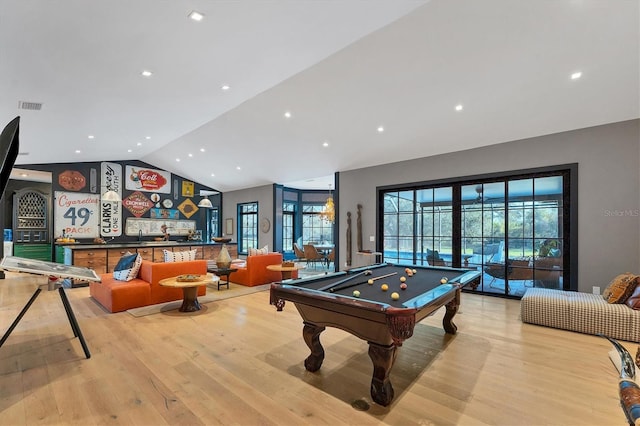 game room featuring lofted ceiling, light wood-type flooring, and billiards