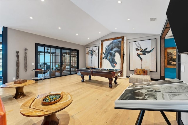 game room with vaulted ceiling, wood-type flooring, and pool table