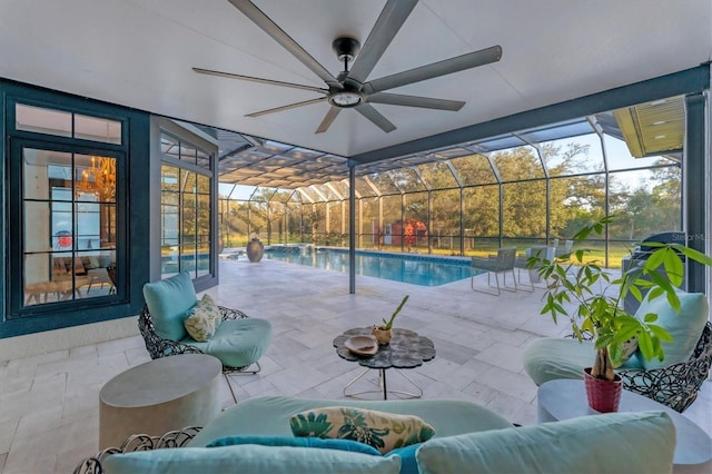 view of swimming pool with an outdoor living space, a patio, ceiling fan, and glass enclosure