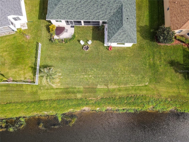 bird's eye view with a water view