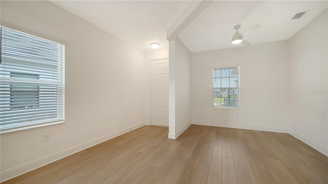 unfurnished room featuring ceiling fan and light hardwood / wood-style flooring