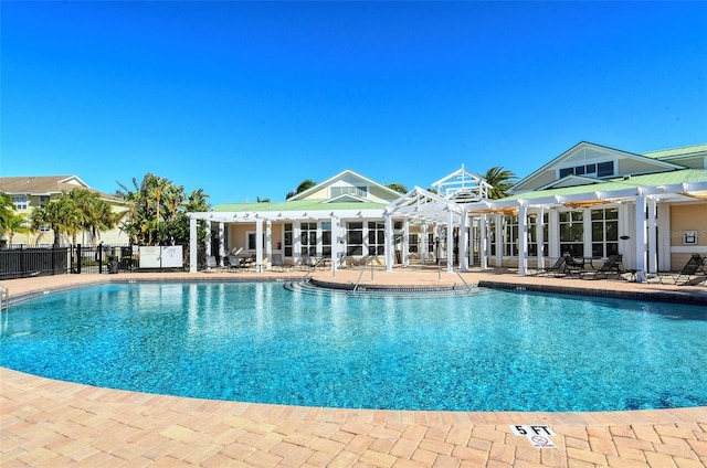 view of swimming pool with a patio