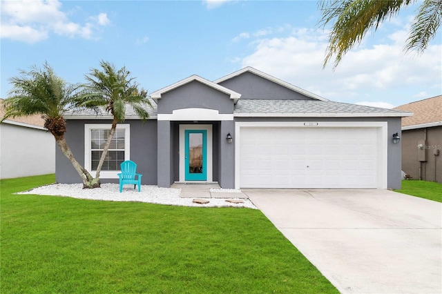 ranch-style home featuring a garage and a front yard