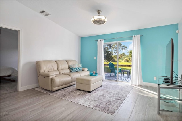 living room with light hardwood / wood-style floors