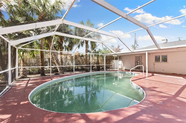 view of pool featuring a patio and a lanai