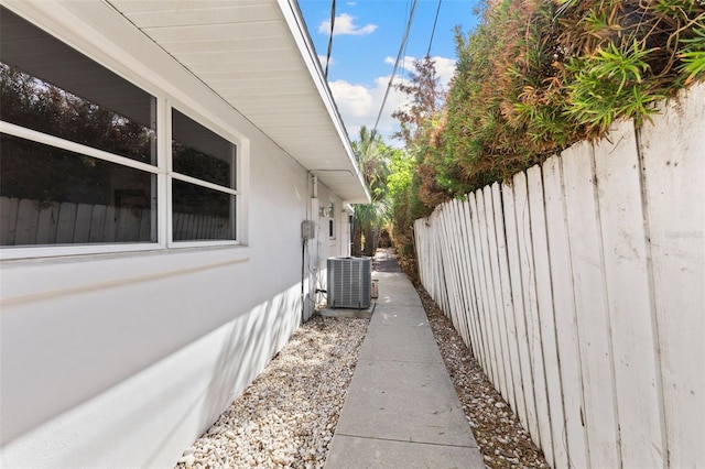 view of home's exterior with central AC