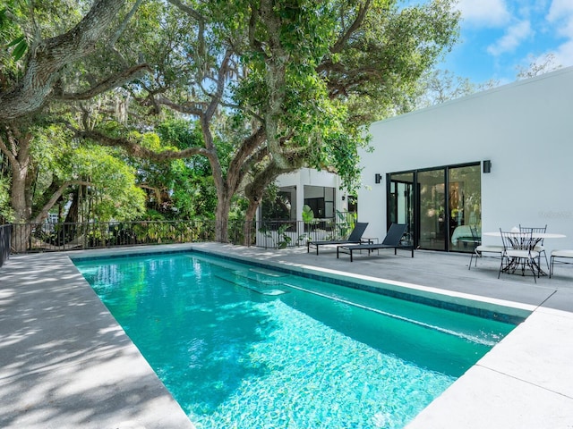 view of pool with a patio