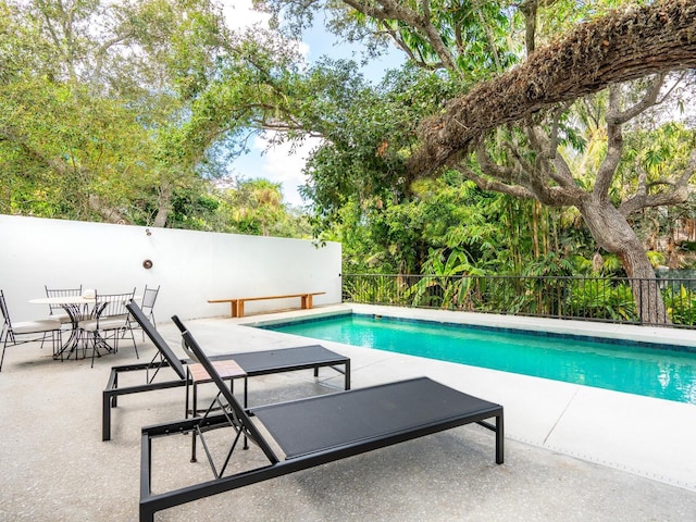 view of pool with a patio