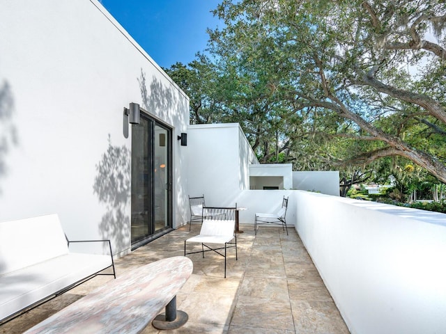 view of patio / terrace featuring a balcony