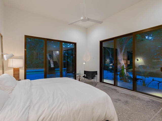 bedroom with carpet, ceiling fan, and access to outside