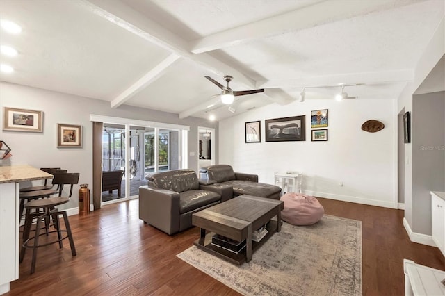 living room featuring ceiling fan, dark hardwood / wood-style flooring, and lofted ceiling with beams