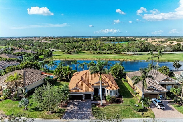 drone / aerial view featuring a water view