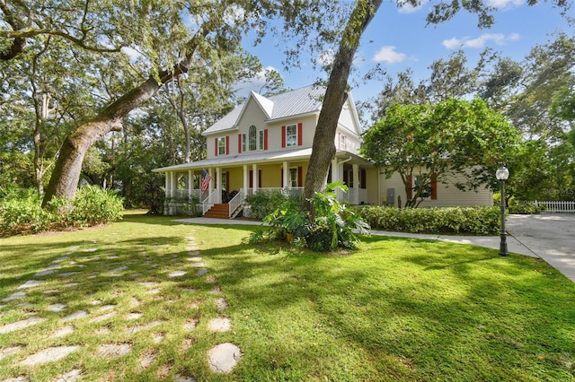 view of front facade with a porch and a front yard