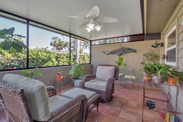 sunroom / solarium with ceiling fan