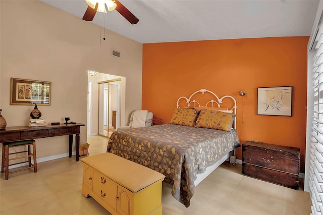 bedroom featuring high vaulted ceiling and ceiling fan