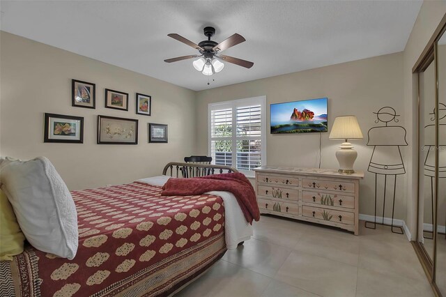 3410 Avenida Madera Unit B, Bradenton, FL 34210 - bedroom featuring ceiling fan and tile patterned floors