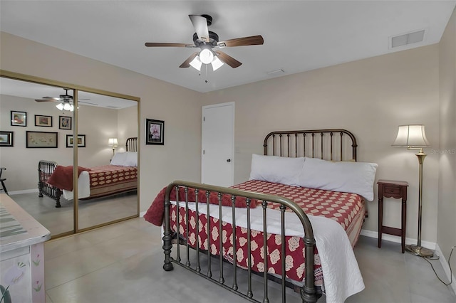 bedroom with ceiling fan and a closet