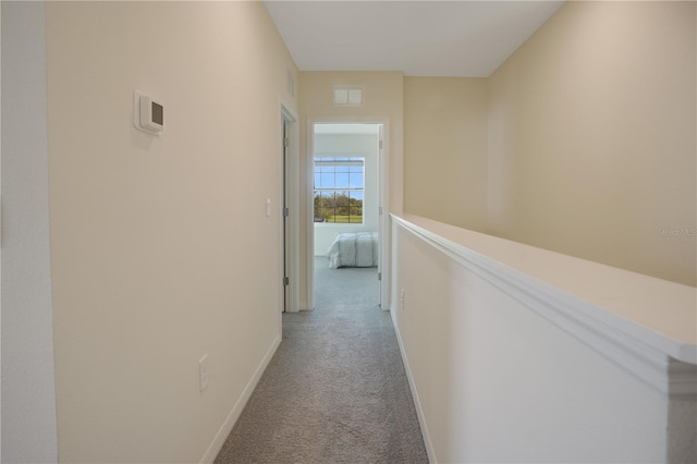 corridor with carpet floors