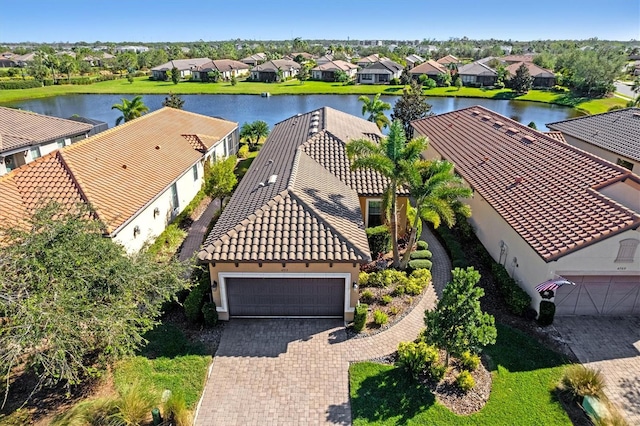 drone / aerial view with a water view