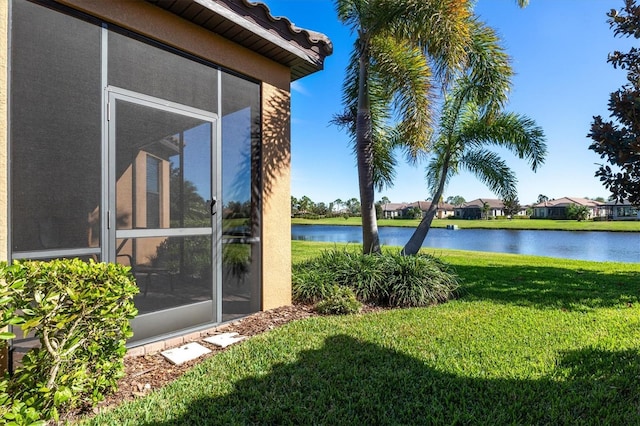 view of yard featuring a water view