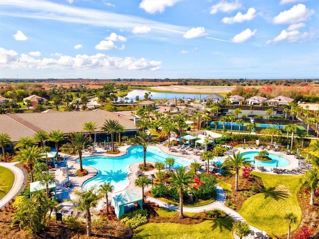 bird's eye view with a water view