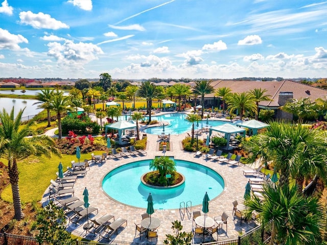 view of swimming pool with a patio area