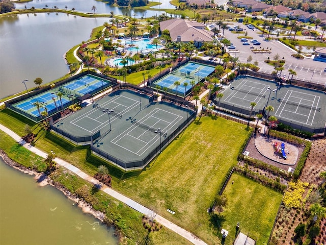 drone / aerial view with a water view