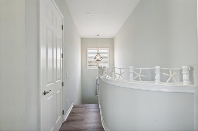 hall with dark hardwood / wood-style floors