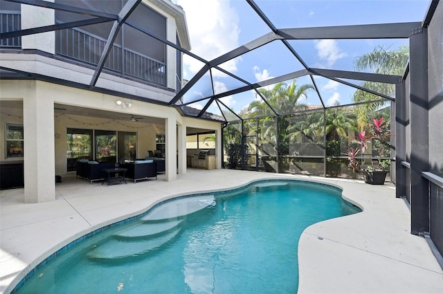 view of pool with a patio, outdoor lounge area, area for grilling, and ceiling fan