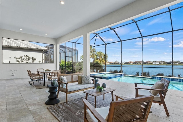 view of swimming pool with a water view