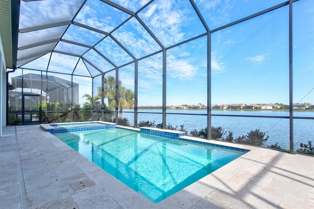 view of swimming pool featuring a water view, a patio area, and a lanai