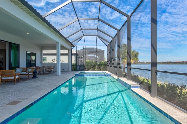 view of swimming pool featuring an outdoor hangout area, a water view, glass enclosure, and a patio area