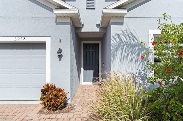 entrance to property with a garage