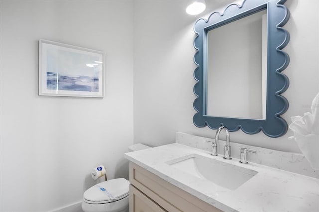 243 S Harbor Dr, Holmes Beach, FL 34217 - bathroom with vanity and toilet