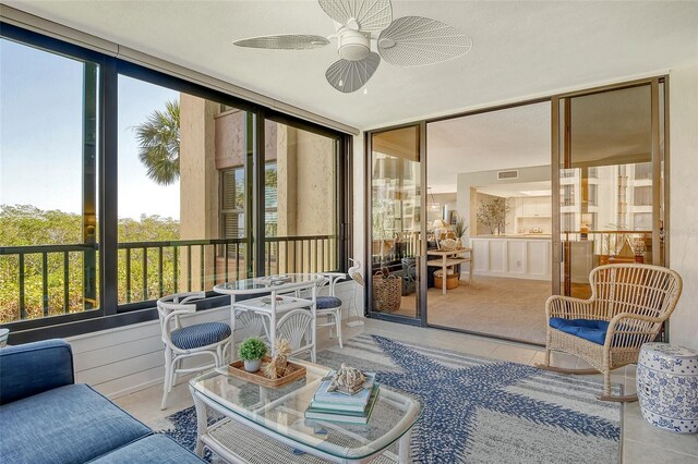8779 Midnight Pass Rd Unit 206H, Sarasota, FL 34242 - sunroom with a ceiling fan