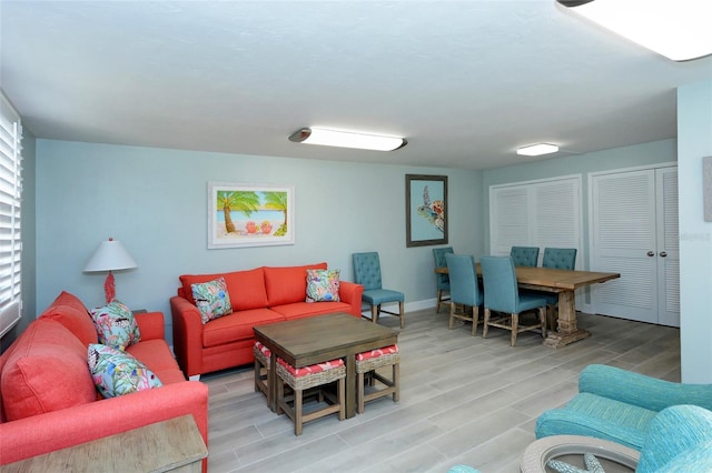 living room with light hardwood / wood-style floors