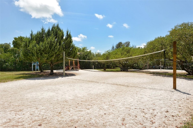 view of property's community featuring volleyball court