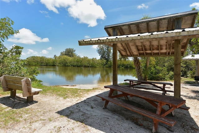 view of community with a water view