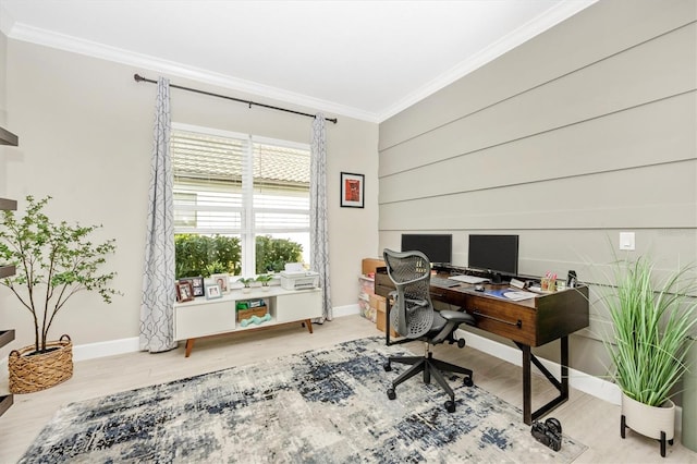 home office featuring hardwood / wood-style floors and crown molding