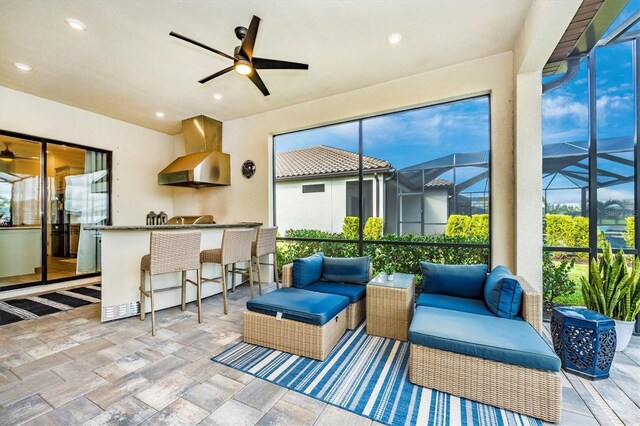 6249 Mesa Gln, Bradenton, FL 34203 - sunroom / solarium with an outdoor living space, ceiling fan, and exterior kitchen