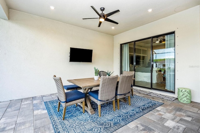 dining space featuring ceiling fan