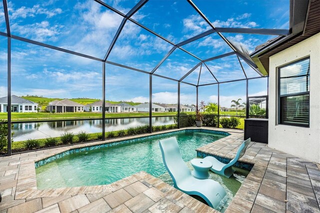 6249 Mesa Gln, Bradenton, FL 34203 - swimming pool featuring a patio area, a residential view, a water view, and a lanai
