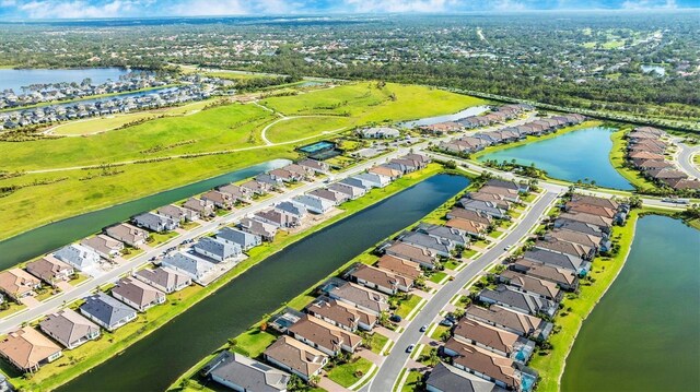 6249 Mesa Gln, Bradenton, FL 34203 - aerial view of property and surrounding area with nearby suburban area and a large body of water