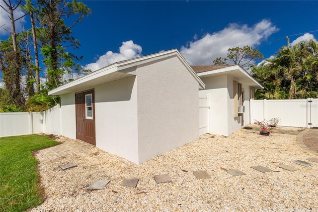 view of property exterior with cooling unit