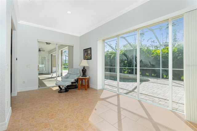 unfurnished sunroom with ceiling fan